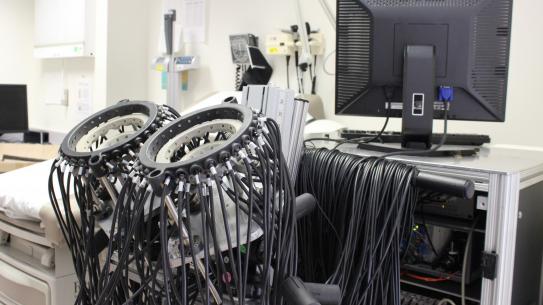 Optical tomography machine, two rings with scanners attached.