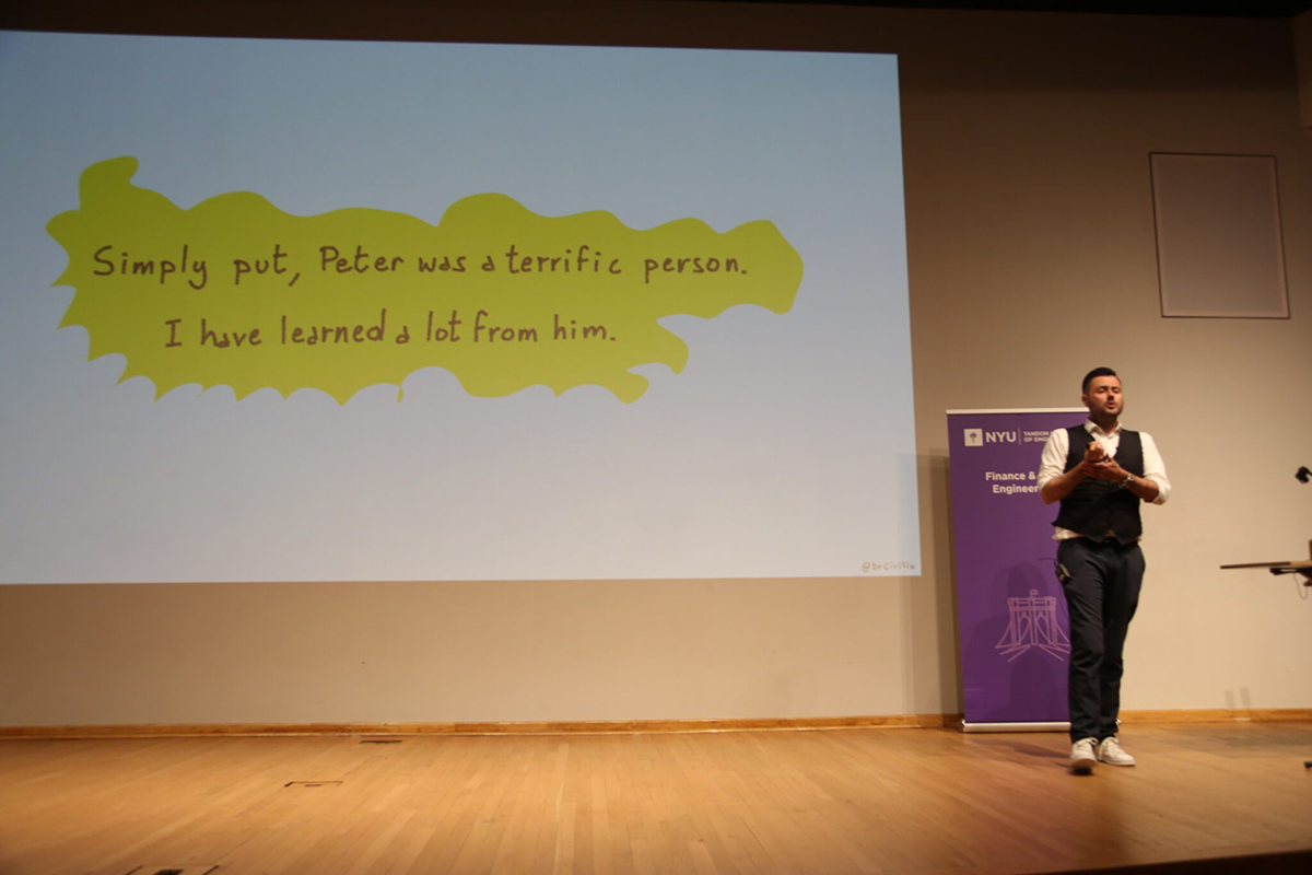 Professor Pasquale Cirillo in front of screen